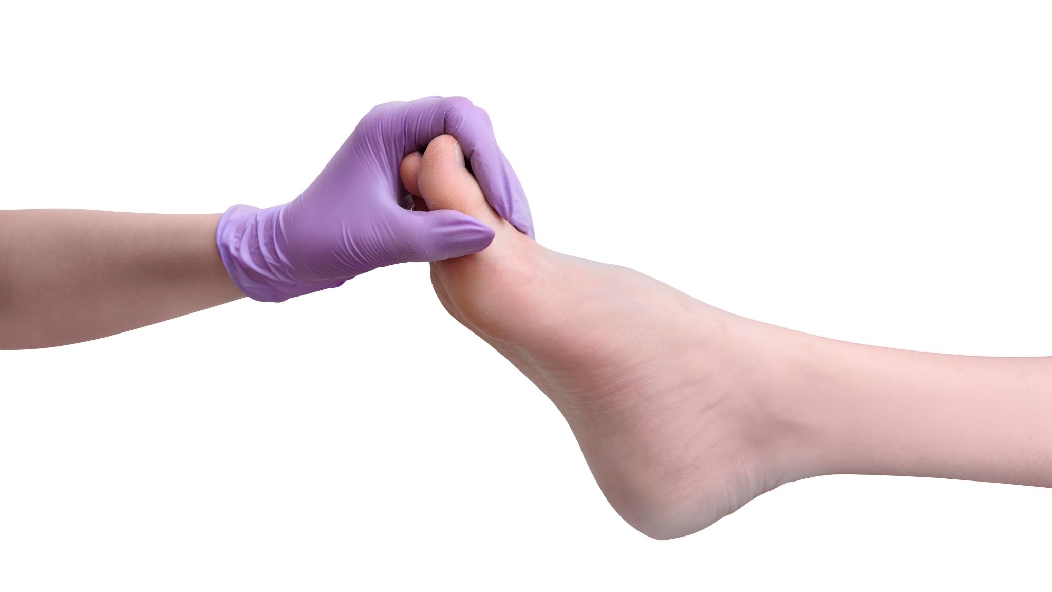 Hand in glove holds female leg 